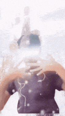 a person wearing headphones is taking a picture of themselves in a mirror