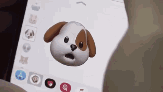 a person is holding a phone with a dog face on the screen
