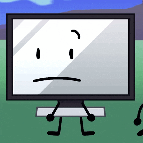 a computer monitor with a sad face on it 's screen