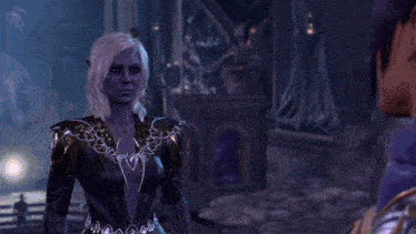 a woman with a purple face and white hair is standing next to a statue
