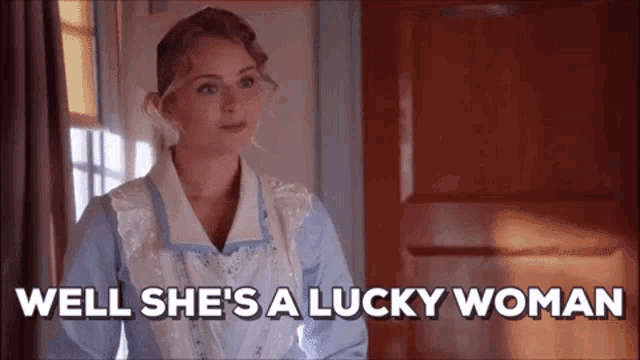 a woman says well she 's a lucky woman in front of a door