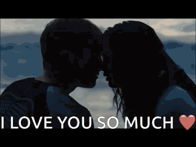 a picture of a man and woman kissing with the words i love you so much