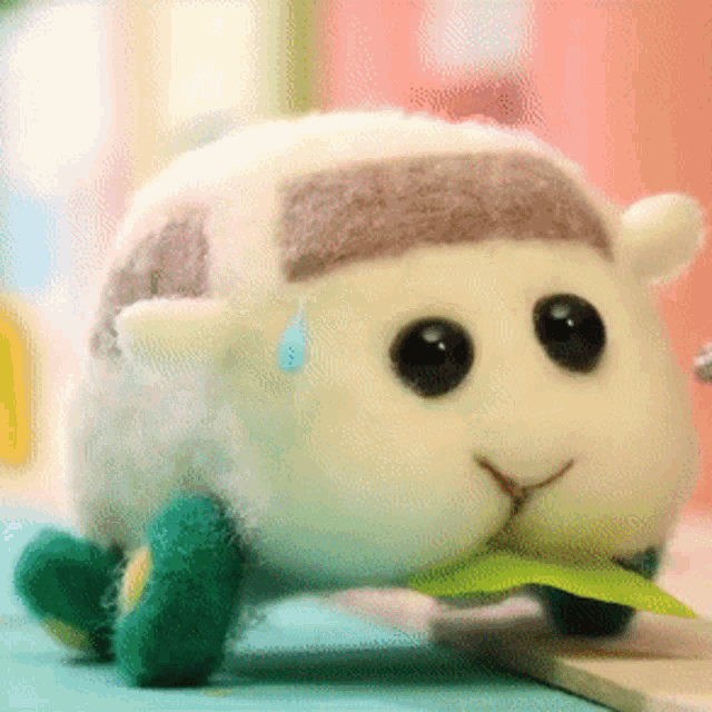 a stuffed animal with a tear coming out of its nose