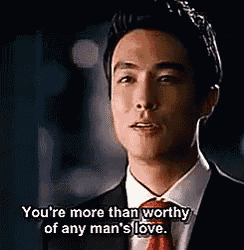 a man in a suit and tie is saying `` you 're more than worthy of any man 's love '' .