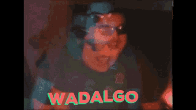 a video of a person with the word wadalgo on the bottom