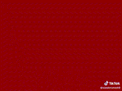 a drawing of a devil with wings and a tail walking on a red background .