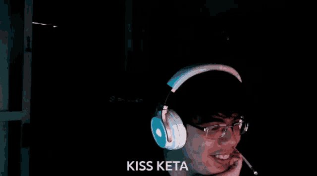 a man wearing headphones says kiss keta