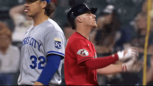 a baseball player wearing a jersey that says kansas city