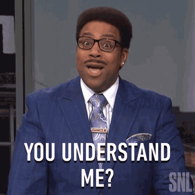 a man in a suit and tie says " you understand me ? "