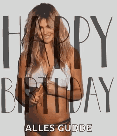 a woman in a bikini is holding a bottle of champagne and saying happy birthday .