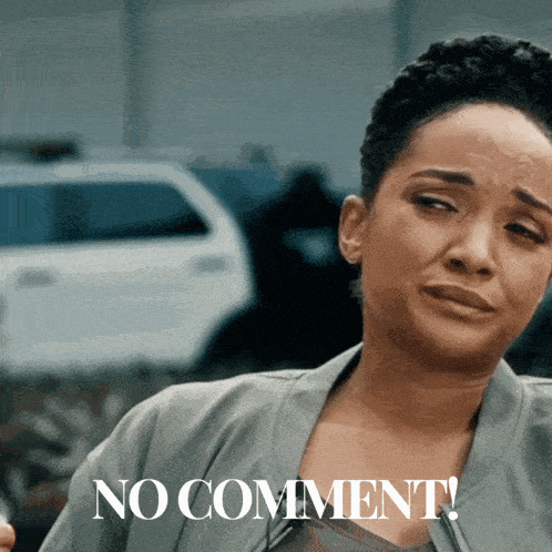 a woman with a sad look on her face and the words no comment