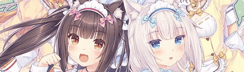a couple of anime girls laying next to each other .