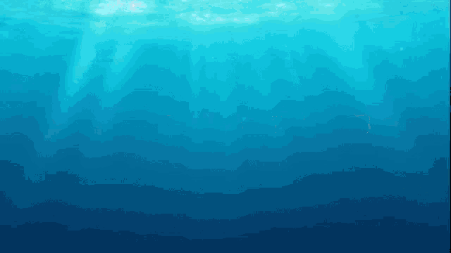 the sun rays are shining through the water