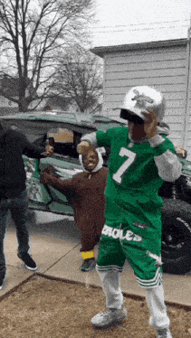 a person wearing a green jersey with the number 7