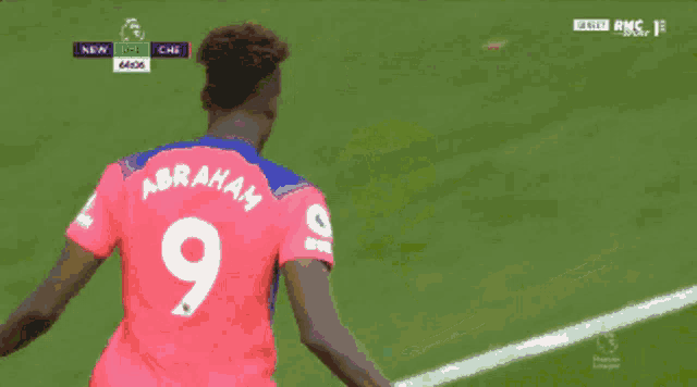 a soccer player wearing a number 9 jersey