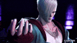 a man with a tattoo on his chest is in a video game with capcom on the bottom
