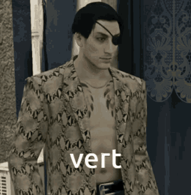 a shirtless man with a tattoo on his eye is wearing a snakeskin jacket with the word vert written on it .