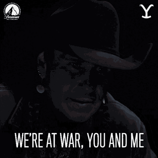 a man in a cowboy hat is saying " we 're at war you and me "