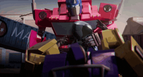 a red robot with the word ma on the side of it