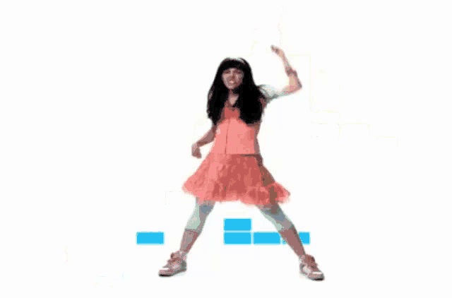 a woman in a pink dress is dancing in front of a rainbow colored equalizer