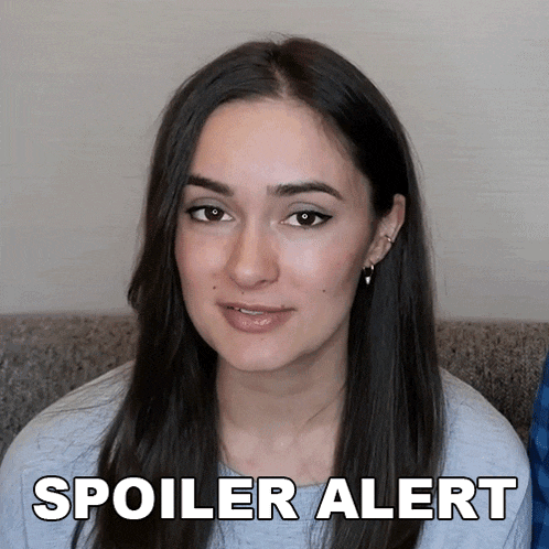 a woman with long hair says spoiler alert in front of her face