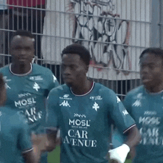 a group of soccer players wearing green jerseys with mosl car menue on them
