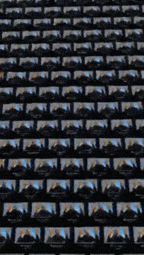 a row of black boxes with a few images of people on them