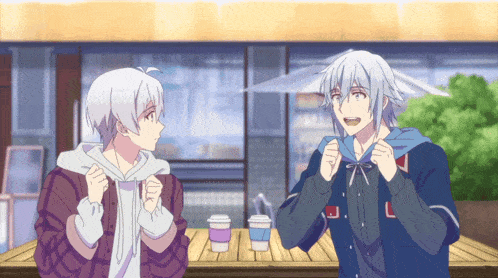 two anime characters are sitting at a table with a cup of coffee