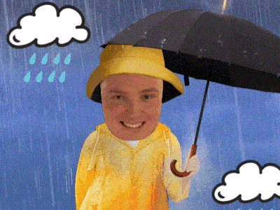 a man wearing a yellow raincoat and holding an umbrella in the rain
