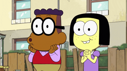 a boy and a girl are standing next to each other