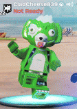 a green lego teddy bear is standing on a blue platform