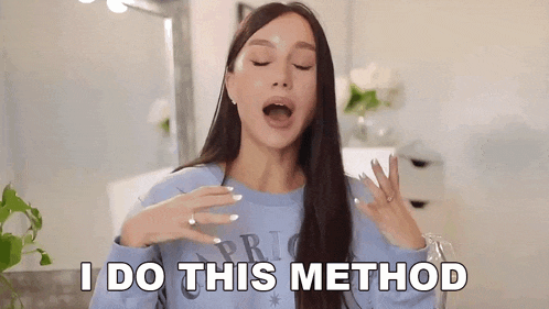 a woman in a blue sweater is screaming and saying `` i do this method '' .