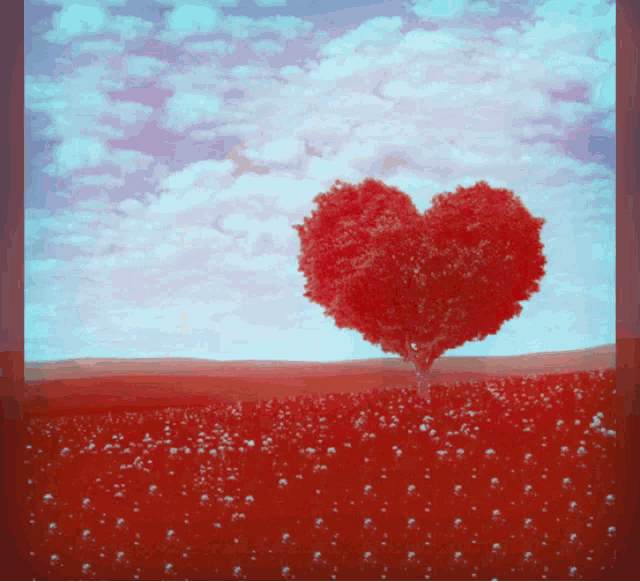 a tree in the shape of a heart in a field