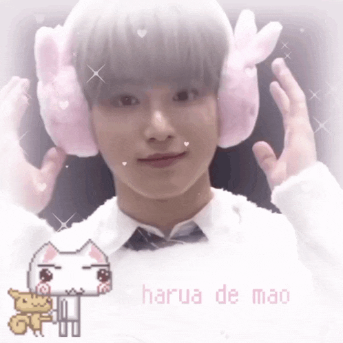 a boy wearing pink bunny ear warmers with harua de mao written on the bottom right