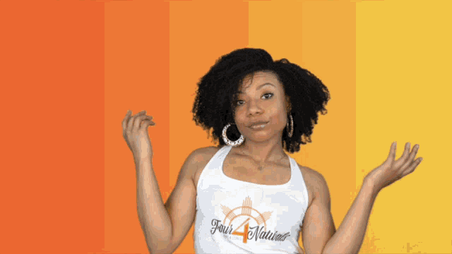 a woman wearing a tank top that says faith natives