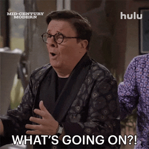 a man says what 's going on while wearing glasses