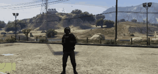 a person in a video game stands in front of a rebel sign