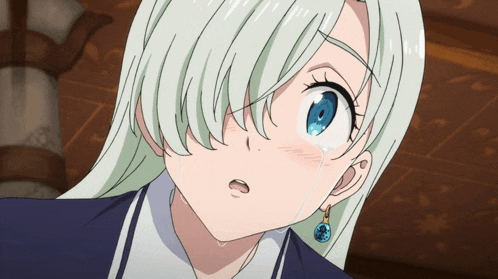 a girl with white hair and blue eyes crying