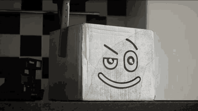 a box with a smiley face drawn on it