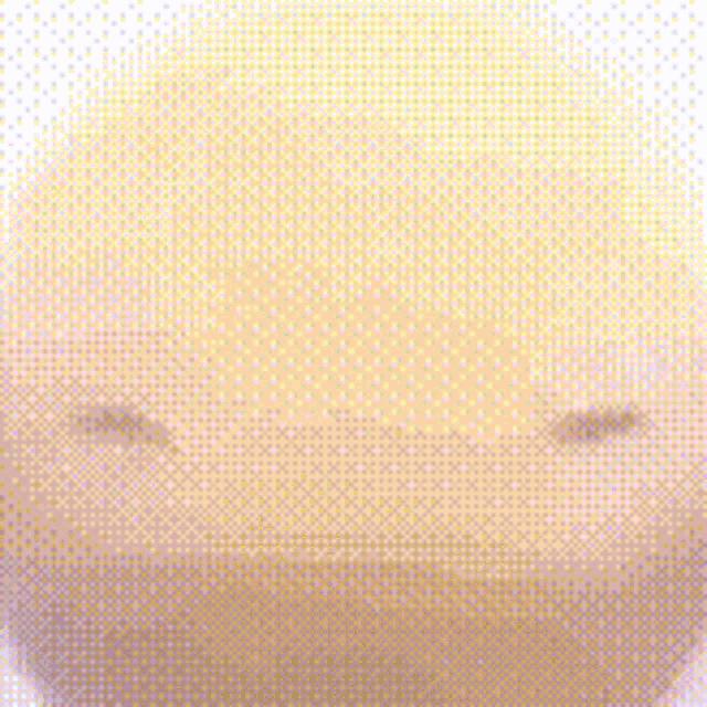 a close up of a yellow smiley face with a big smile on it .
