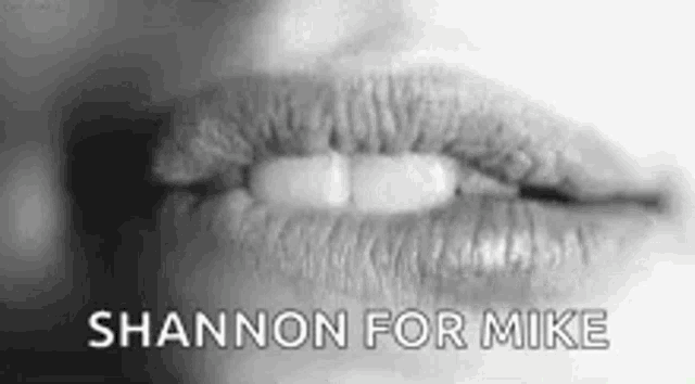a black and white photo of a woman 's lips with the words `` shannon for mike '' written above it .