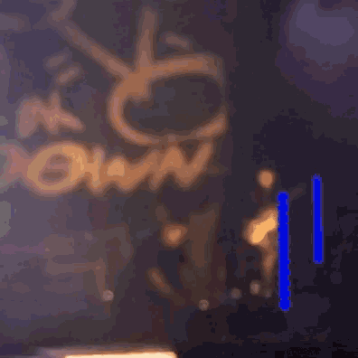 a blurry picture of a sign that says " ok down "