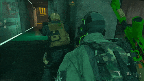 a screenshot of a video game shows two soldiers in a room