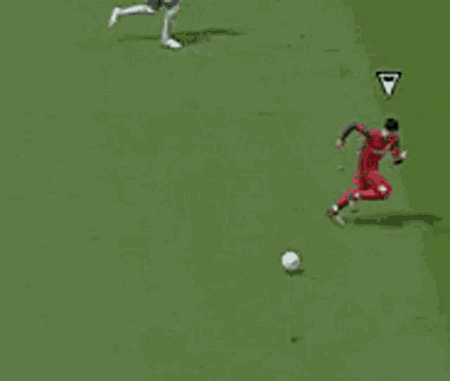 two soccer players are on a field with the words kojak says no