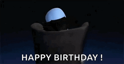 a cartoon character from the movie megamind is sitting in a chair and says `` happy birthday '' .