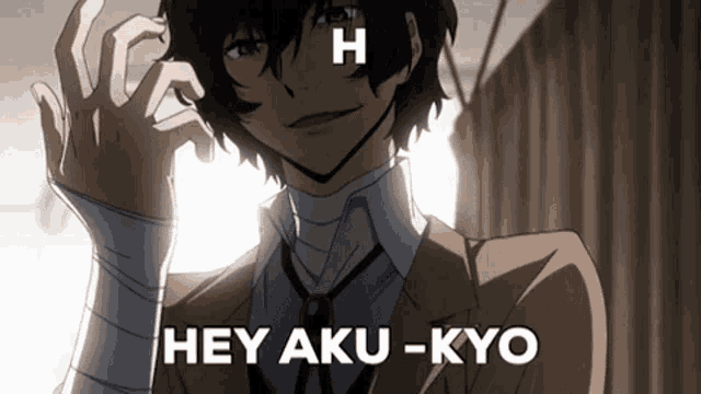 a man in a suit and tie says hey aku kyo
