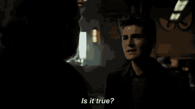 a man talking to another man with the words " is it true " on the bottom