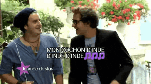 two men are standing next to each other with the words mon cochon d ' inde d ' inde