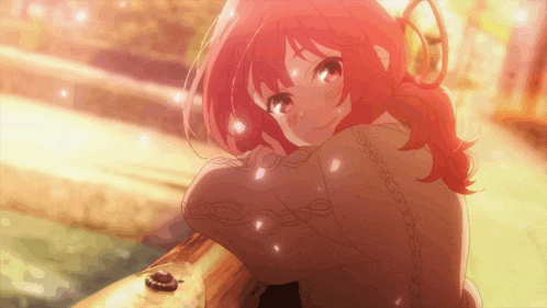a girl with red hair is sitting on a bench