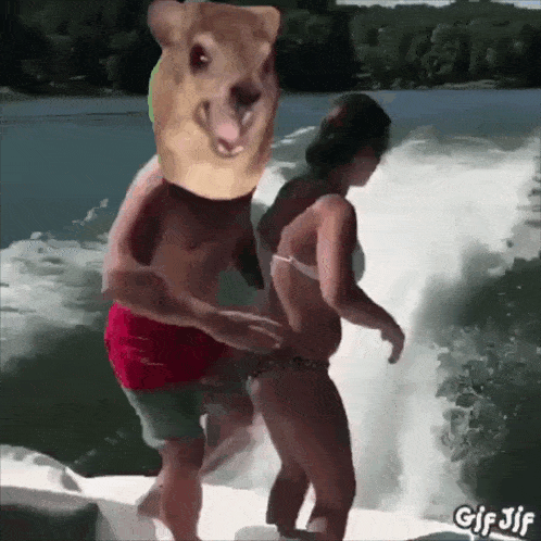 a man with a squirrel head is standing next to a woman